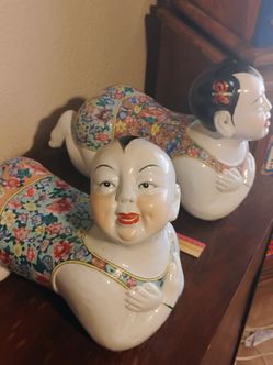 Antique charming and colorful Asian porcelain pillow/headrest in the form of a girl & boy