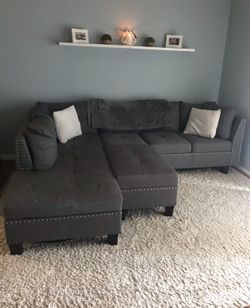 Grey Couch & White Large Rug