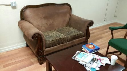 Leather love seat couch.
