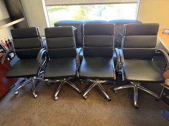 Five conference table chairs