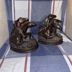 Horse statue book ends damaged