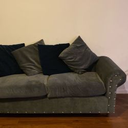 Gray Couch With blue Pillows