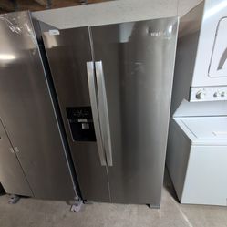 New scratch and dent Whirlpool Side-By-Side refrigerator, stainless ice and water indoor