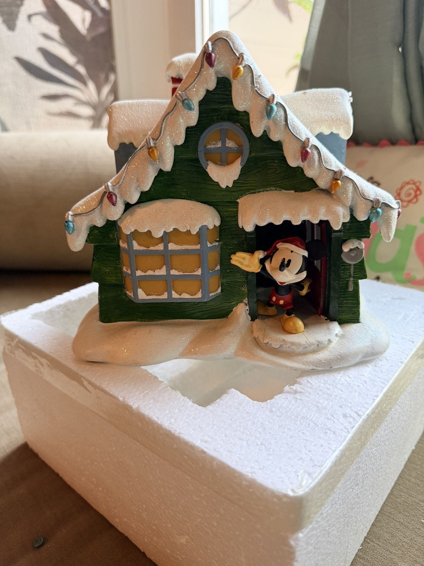 Disney Mickey Mouse illuminated holiday village collectible. 
