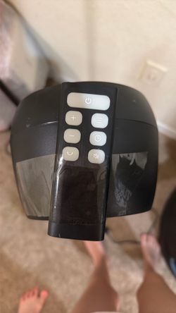 Black standup electrical fan with remote