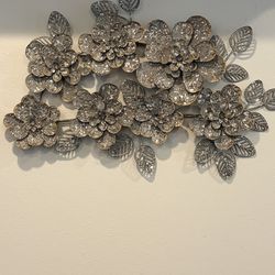 Gray metal floral wall hanging