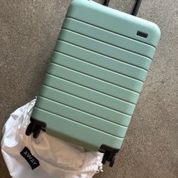 Away Carry On Hard Shell Luggage, Brand New. 