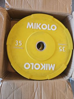 Plates , Disc  35 pounds each.  2 piezas