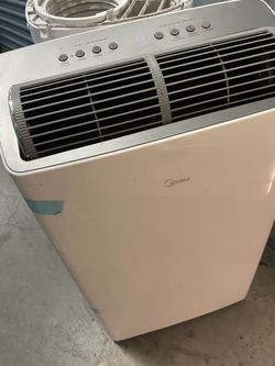 Portable Air Conditioner Needs Attachments Works Good 