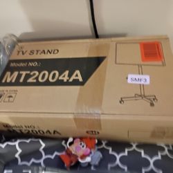 Black T.V. Stand With A Little Shelve