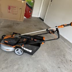 Battery Powered Mower, blower, Weed Eater, And Battery Charger + 1 Battery.