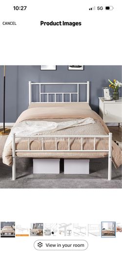 Black twin metal bed frame.
