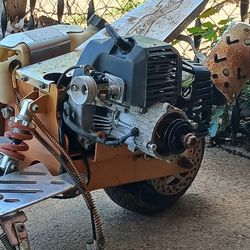 Gas And Electric Scooter. Formula Motorcycle Or Scooter. 