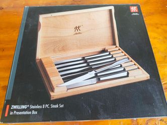 Zwilling  JA Henckels stainless steak knives eight pieces