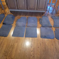 Subaru carpeted auto floor mats.