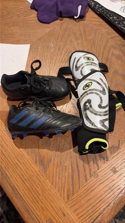 Little kids soccer cleats and shin guards