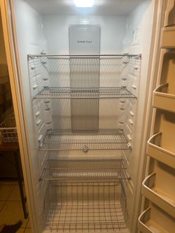 Frigidaire upright freezer.