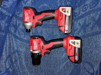 Milwaukee M18 18V lithium ion brushless cordless compact drill impact combo with two batteries