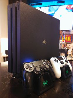 PS4 Pro 1TB with 2 controllers + Charging Station