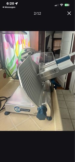 This is an Edlund EDV-12C Edvantage 12-inch gravity feed meat slicer.