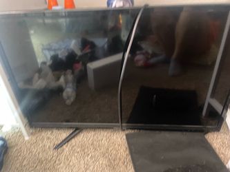 Large Flat Screen TV with Stand