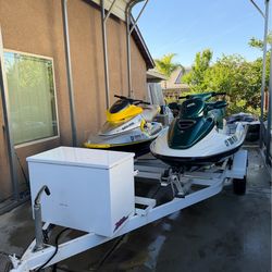 Two jet skis with trailer