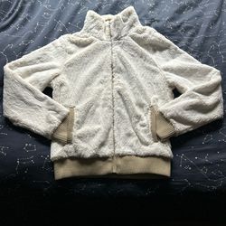 tan and cream faux fur Patagonia zip up jacket