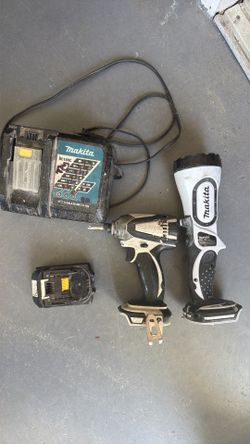 Makita impact drill, battery, charger and light
