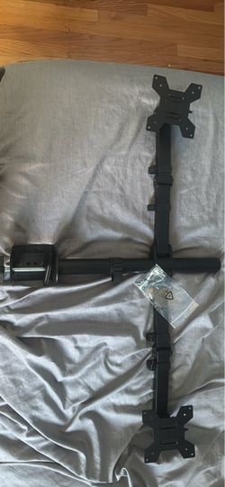 Dual monitor mount with 8 screws.