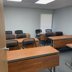 Folding training desks and rolling chairs