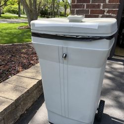 Sears Heavy Duty Plastic Rolling Garbage Can. 34” High; 20” Wide;  15 1/2” Deep. Easily holds a 39 gallon black garbage Bags. 