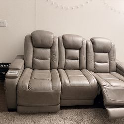 Moving out Sale - on Ashley The Man-Den Power Reclining Sofa – Good Condition
