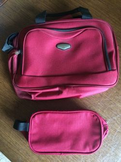 Red and black luggage