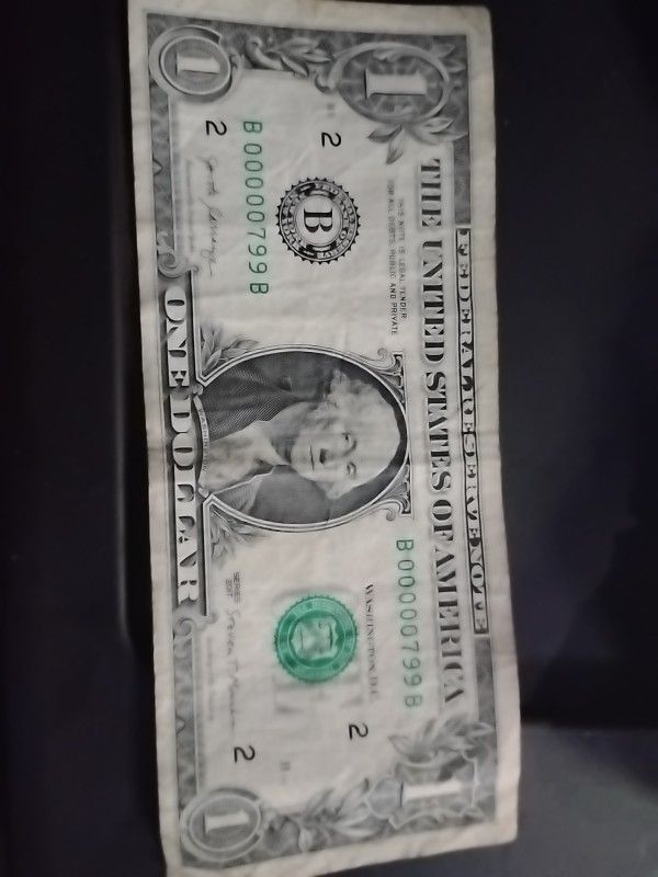 Valuable Dollar bill with very low serial number(poker value)