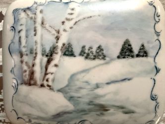 Hand-Painted Ceramic Winter Scene Landscape Trinket Box   Elegant ceramic trinket box with a hand-painted winter scene. This two-piece set has a white