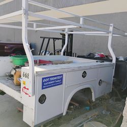 Utility Bed And Ladder Rack. Damaged As Seen In Photos