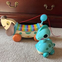 Wooden Alpha Pup & Touch and Go Musical Dino