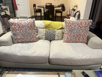 Comfortable Beige Sofa with Decorative Pillows