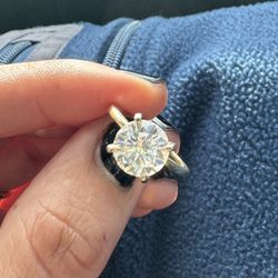 10k yellow gold. 3ct moissanite size 6