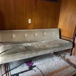 Mid-century velvet sofa with chrome arms