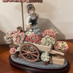 LLADRO  “Flowers of the Season” with Girl, Flower Cart, Umbrella & Birds #1454, Height-12” L-11” , W-7.5”