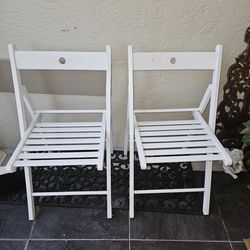 2 WOOD FOLDING CHAIRS $15 EACH