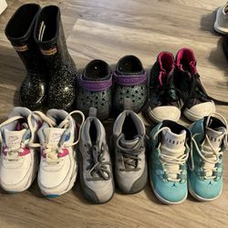 2 Pairs Of Jordan’s,Nike,Converse, Crocs And Hunter Boots All Size 7 