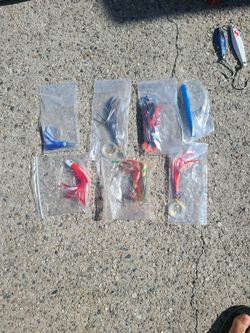 Tuna, Trolling Plug And Feathers