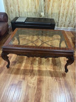 Glass Top Carved Wood Coffee Table