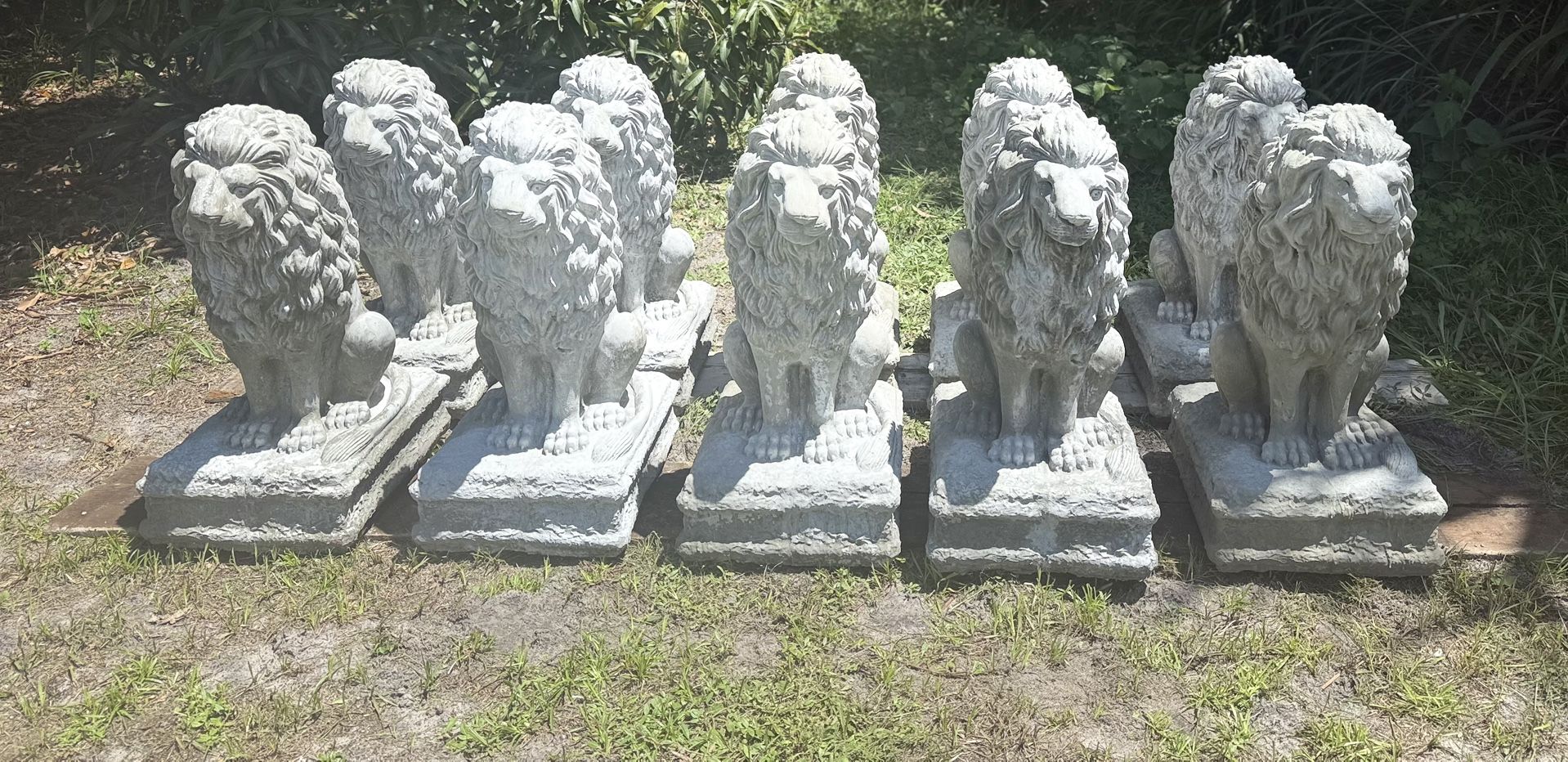 solid concrete lions $100 each,,