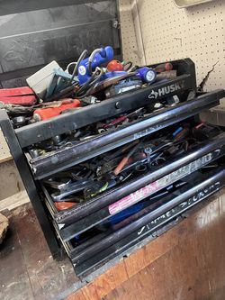 Box of sockets wrenches and other miscellaneous tools