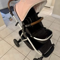 Mockingbird Stroller With 4T Clothes