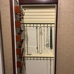 Jewelry cabinet with mirror
