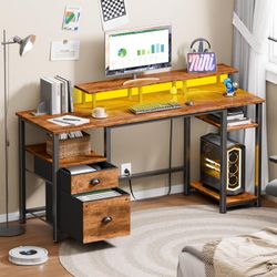 Furologee 61" Computer Desk with Power Outlet and LED Lights, Desk with Fabric File Cabinet Drawer, Large Reversible Table with Shelves and Monitor St